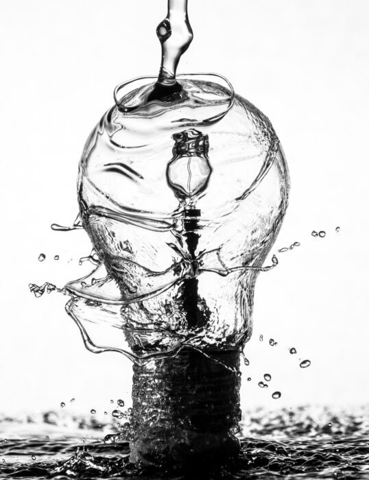 Water streaming over lightbulb